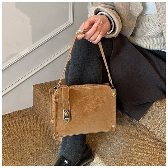 Damen elegante Schultertasche mit abnehmbarem Trageriemen und luxuriösen Details Nord Taschen