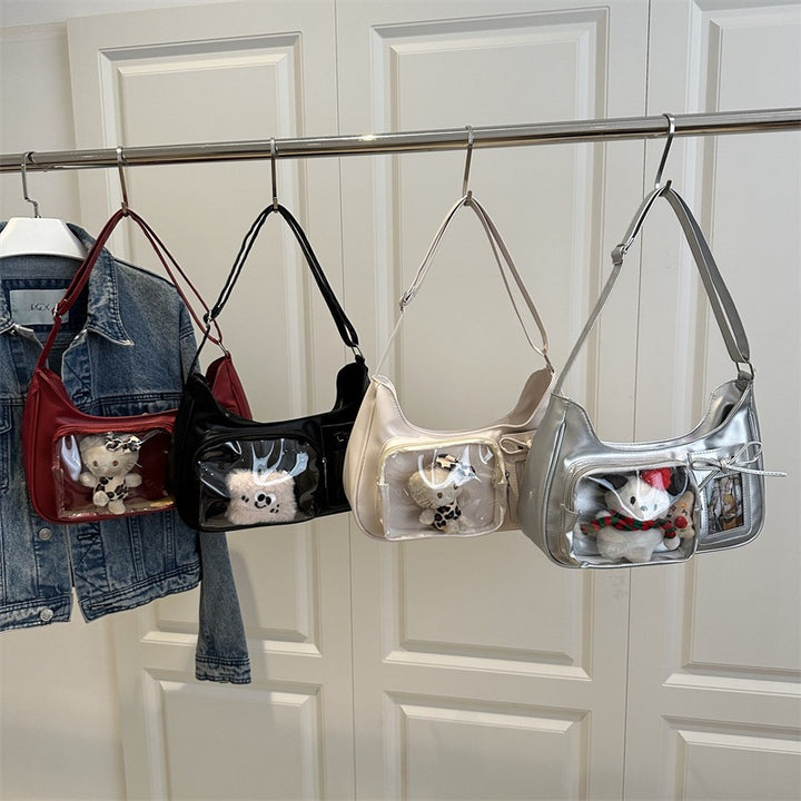 Damenhandtasche mit transparentem Fach von Nord Taschen