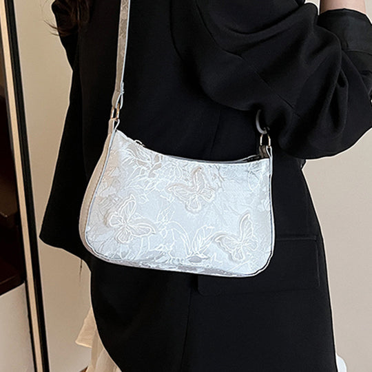 Damen Handtasche mit handgearbeitetem Blumenmuster und modischem Kettenriemen Nord Taschen