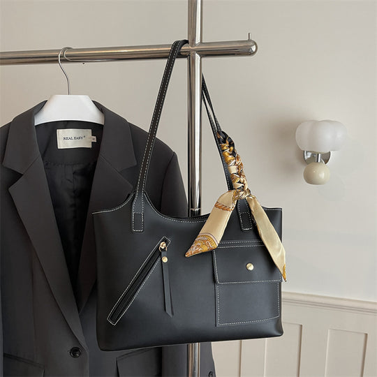 Damen moderne Handtasche mit praktischen Fächern und kreativen Designelementen Nord Taschen