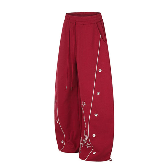 Damen Lockerfallende Palazzo‑Sweathose im Athleisure‑Look mit Tunnelzugbund und Script‑Print Nord Taschen