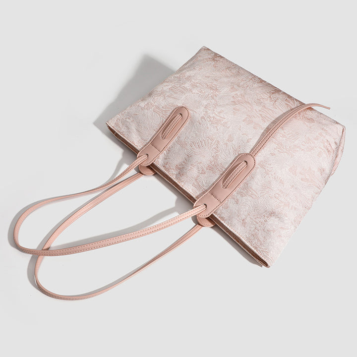 Damen Shopper-Tasche mit floralen Prägungen und strapazierfähigem Außenmaterial Nord Taschen
