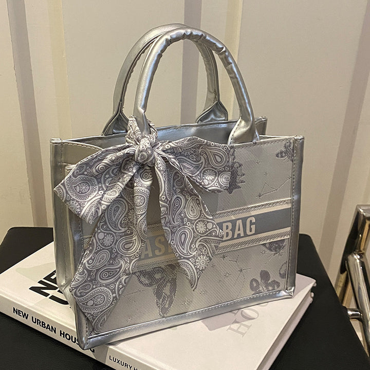 Damen Handtasche im eleganten Design mit dekorativem Schal Nord Taschen