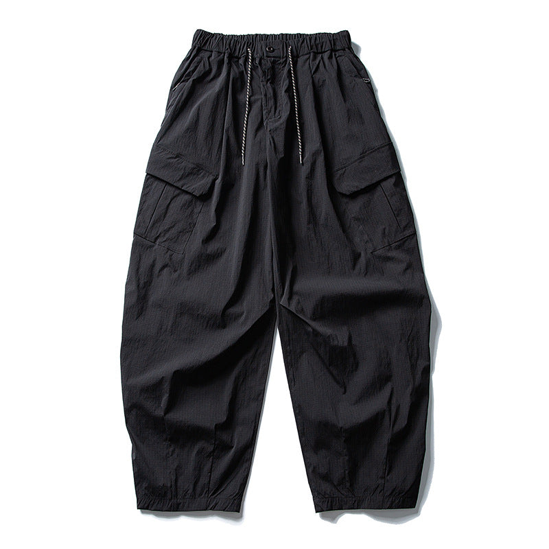 Herren Weite Ripstop-Cargo-Hose im Balloon-Schnitt mit Tunnelzugbund, Oversize-Klappentaschen und elastischen Knöchelabschlüssen Nord Taschen