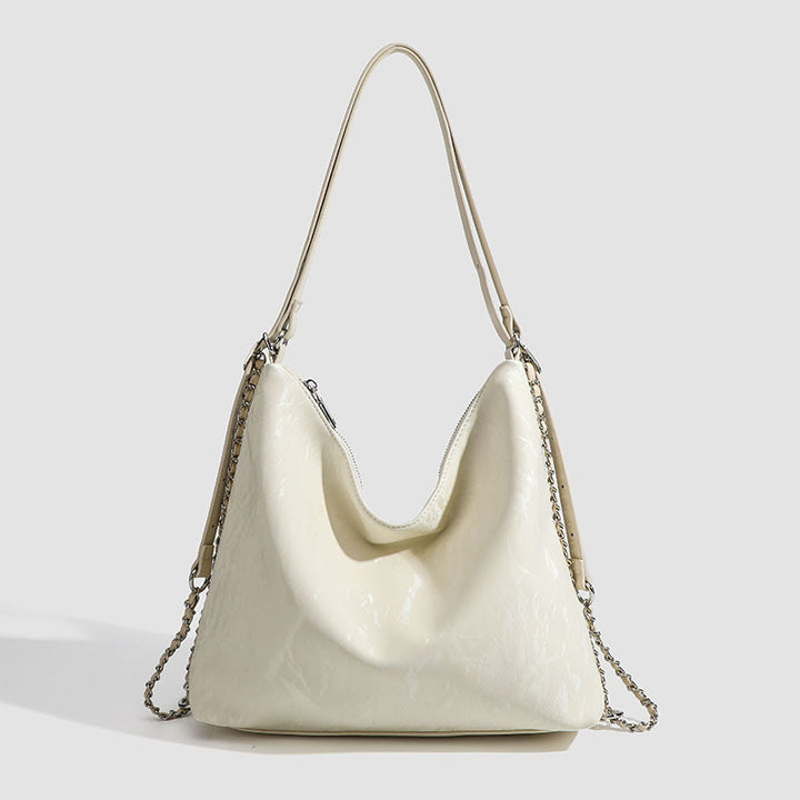 Damen Hobo-Tasche mit großzügigem Innenraum und eleganter Kettenapplikation Nord Taschen