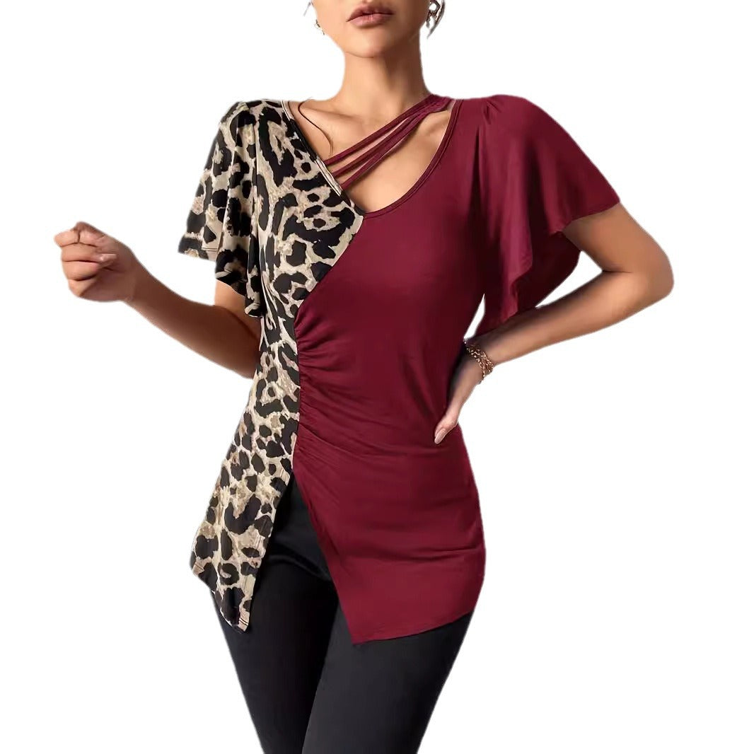 Damen Designermode Oberteil mit asymmetrischem Schnitt und Leopardenmuster