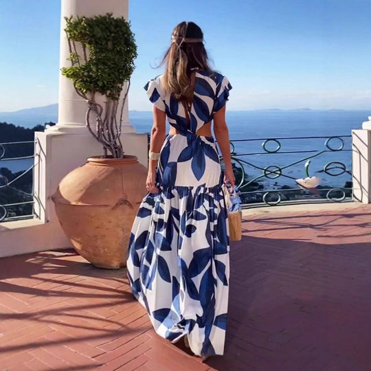 Damen Maxi-Kleid mit raffinierten Cut-Out-Details und voluminösen Rüschen Nord Taschen