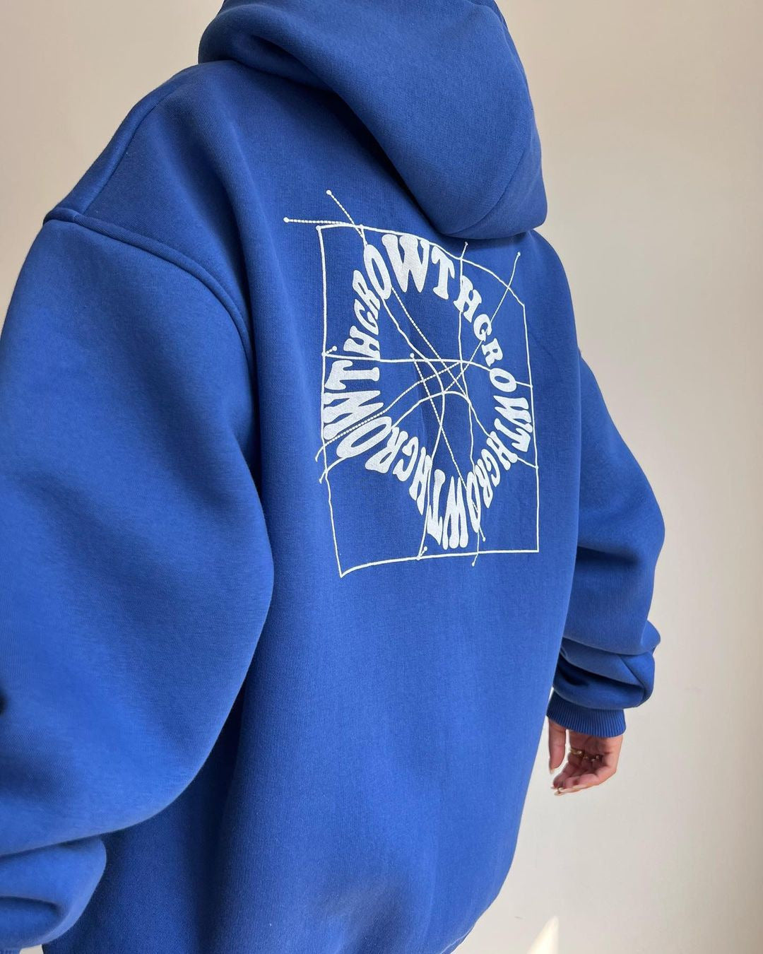 Damen Oversized Kapuzenpullover mit abstraktem Rückenprint und gerippten Bündchen Nord Taschen