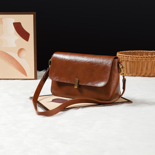 Damen Umhängetasche aus hochwertigem Kunstleder mit elegantem Klappenverschluss Nord Taschen