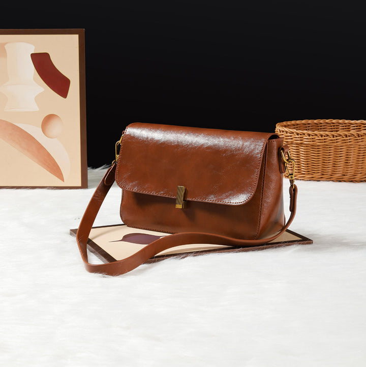 Damen Umhängetasche aus hochwertigem Kunstleder mit elegantem Klappenverschluss Nord Taschen