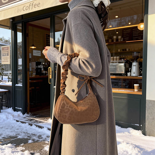 Damen Umhängetasche mit strukturiertem Design und stilvollem Kordelzug Nord Taschen