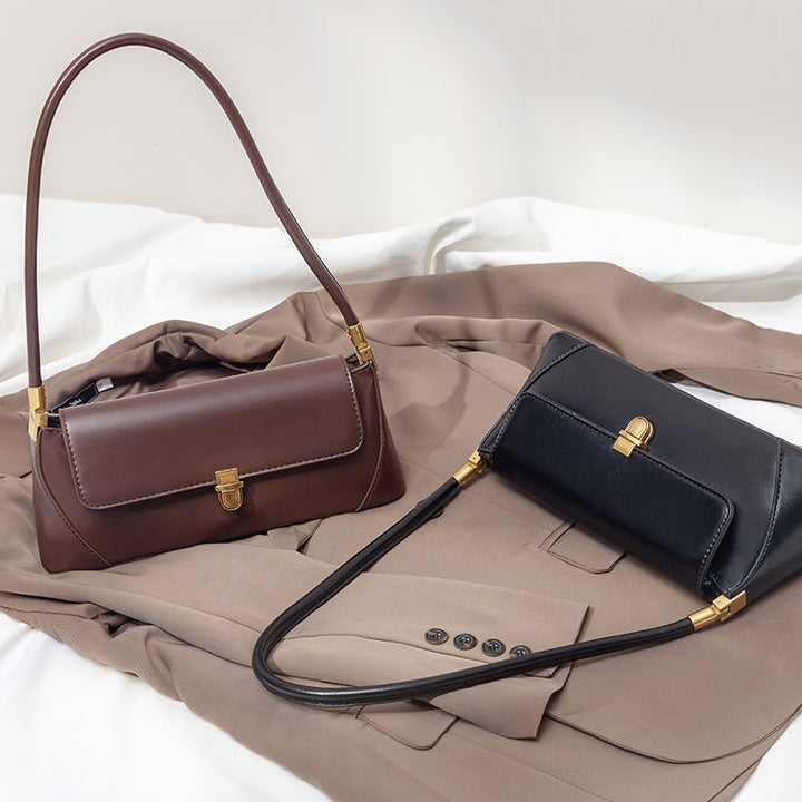 Damen Clutch mit eleganter Faltoptik und stilvollen Metallakzenten Nord Taschen
