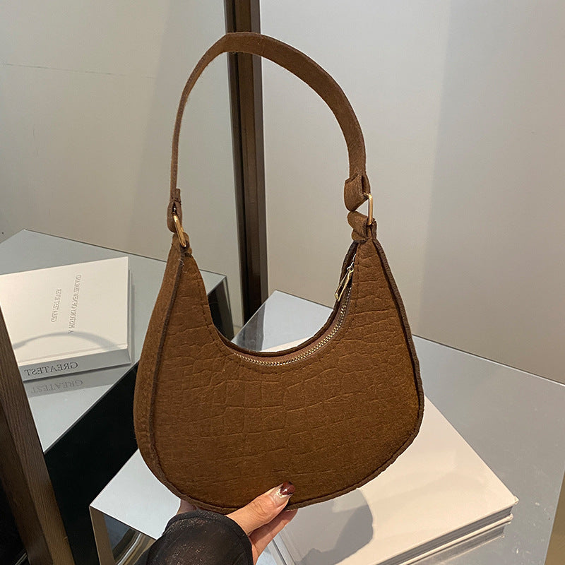 Damen Umhängetasche mit strukturiertem Lederlook und goldenen Akzenten Nord Taschen