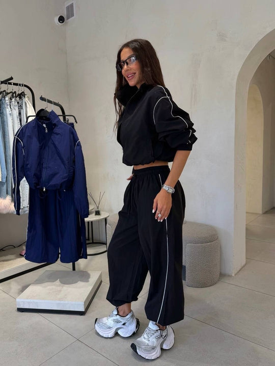 Damen Kurzgeschnittenes Windbreaker-Set mit weiter Trackhose und Kontrastpaspel Nord Taschen