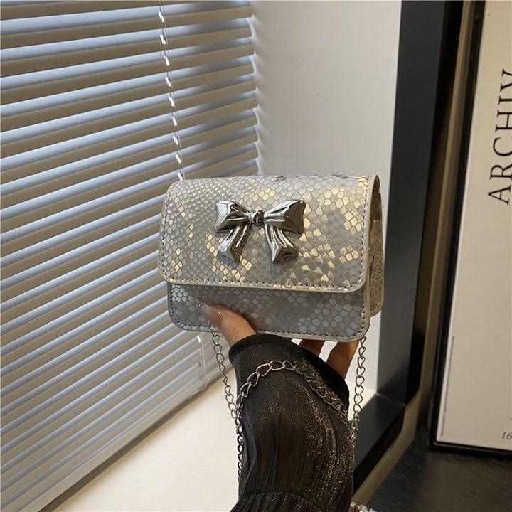 Damen Clutch mit verspieltem Schleifendesign Nord Taschen