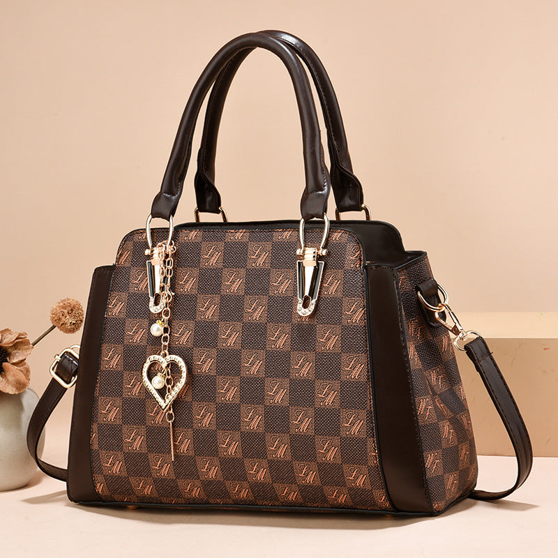 Damen Handtasche mit luxuriösem Mustermix und abnehmbarem Anhänger Nord Taschen