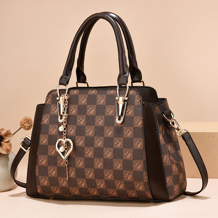 Damen Handtasche mit luxuriösem Mustermix und abnehmbarem Anhänger Nord Taschen