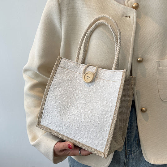 Damen Jute-Handtasche mit floraler Struktur und stilvollen Details Nord Taschen
