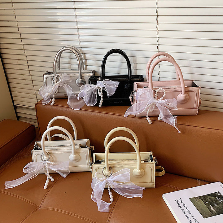Damen elegante Handtasche mit Perlenakzent Nord Taschen