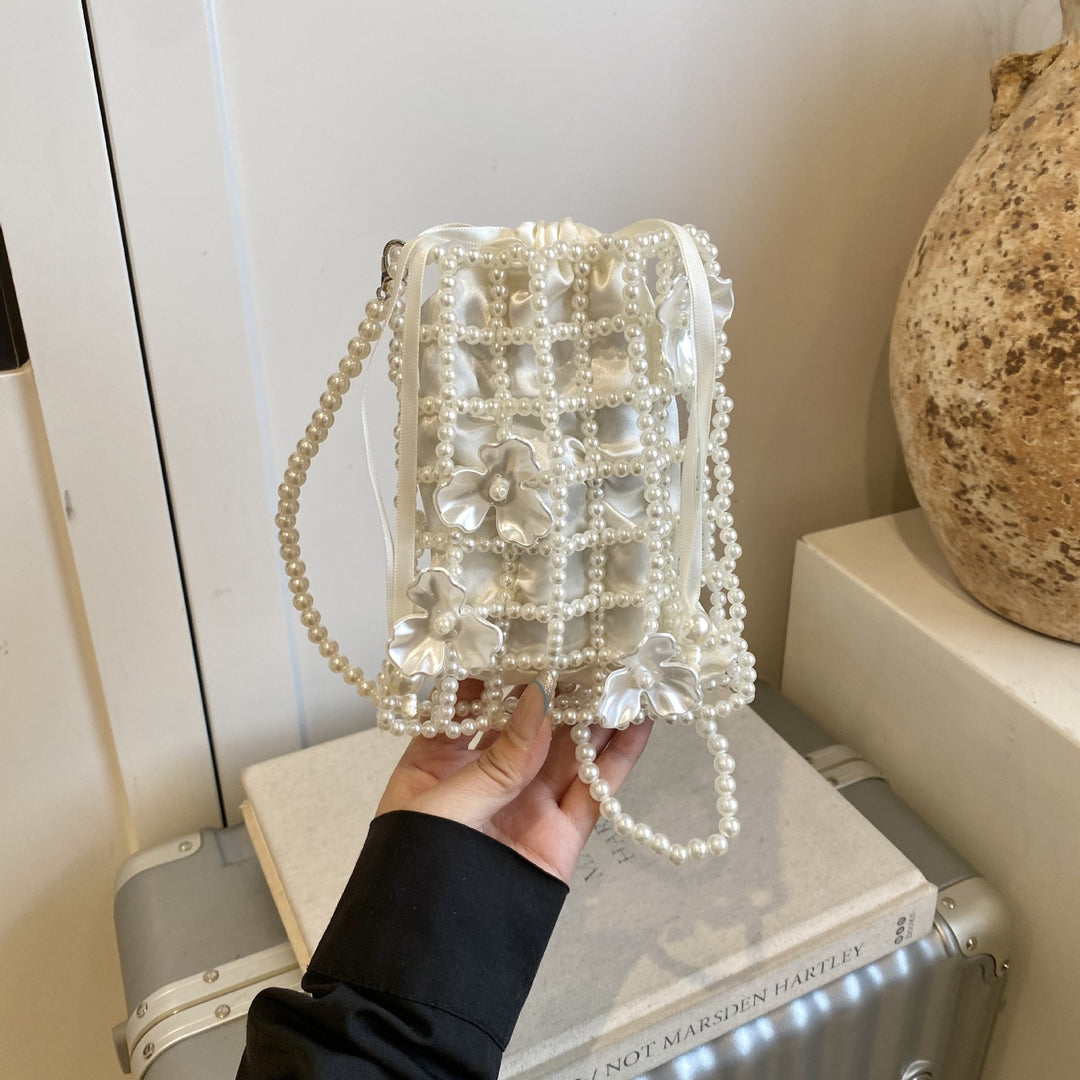 Damen Perlenbesetzte Clutch mit floralem Design Nord Taschen