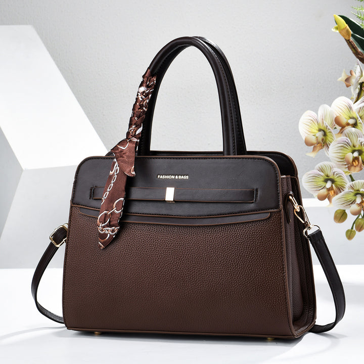 Damen elegante Handtasche mit praktischen Fächern und verspieltem Schal Nord Taschen