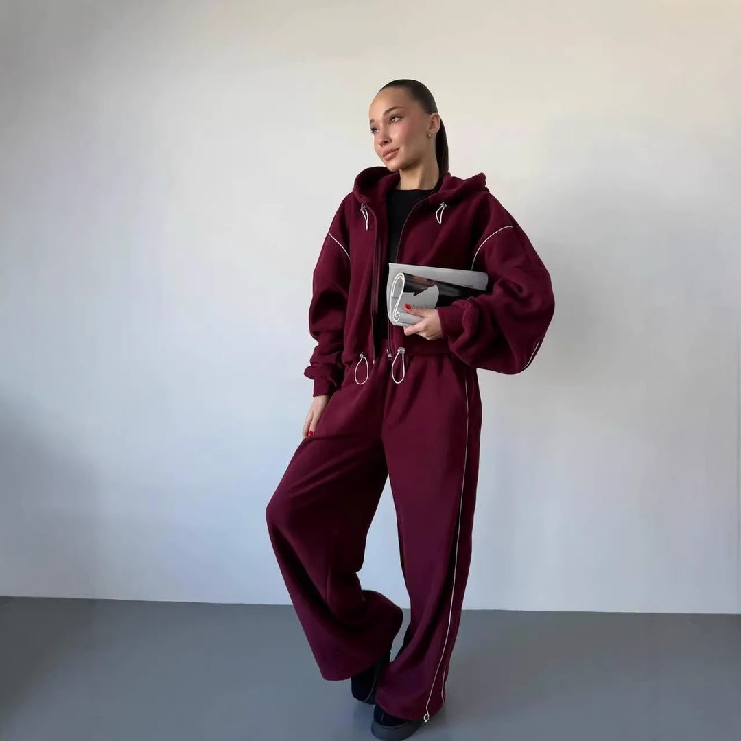 Damen gekürztes Zip-Hoodie mit Tunnelzug und hochgeschnittener weiter Fleece-Loungehose Nord Taschen