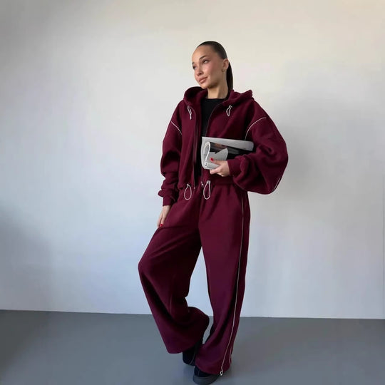 Damen gekürztes Zip-Hoodie mit Tunnelzug und hochgeschnittener weiter Fleece-Loungehose Nord Taschen