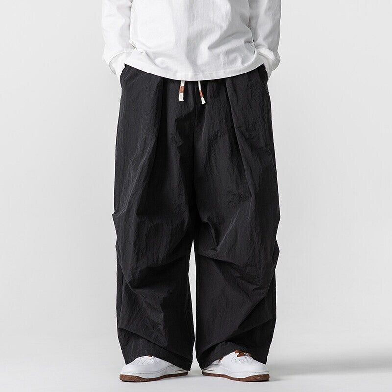 Herren Weite Utility-Loungehose mit überlappenden Falten und Kordelzugbund Nord Taschen