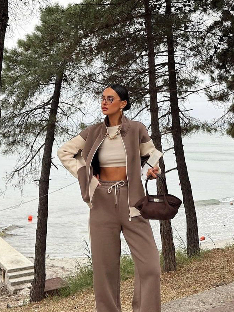 Damen athletisches Zweiteiler-Set aus strukturiertem Sweatstoff mit gekürzter Reißverschlussjacke und hochgeschnittener Jogginghose mit weitem Beinverlauf Nord Taschen