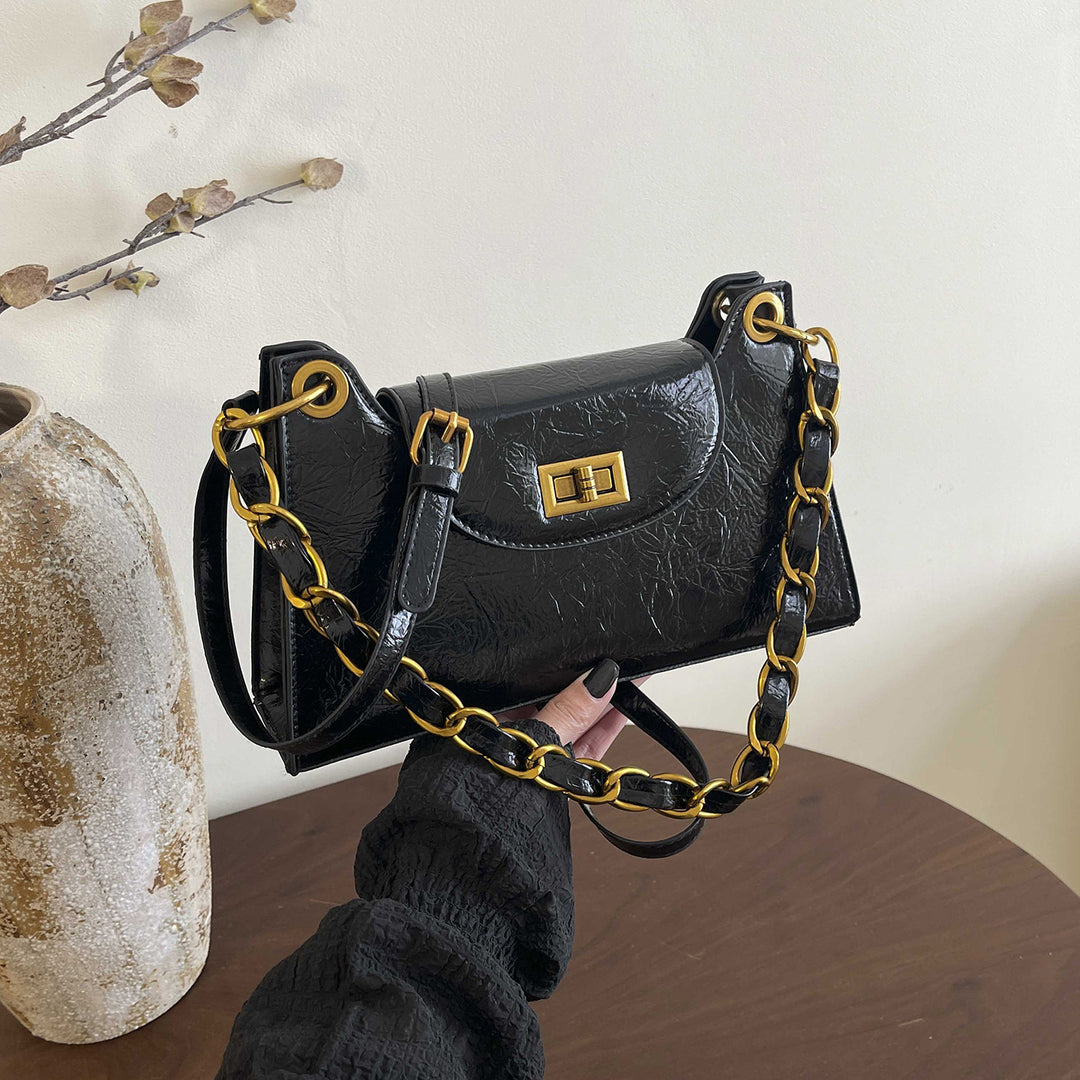 Damen elegante Handtasche mit dekorativem Kettenhenkel Nord Taschen