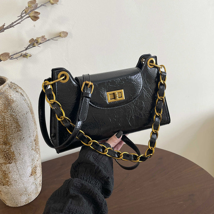 Damen elegante Handtasche mit dekorativem Kettenhenkel Nord Taschen