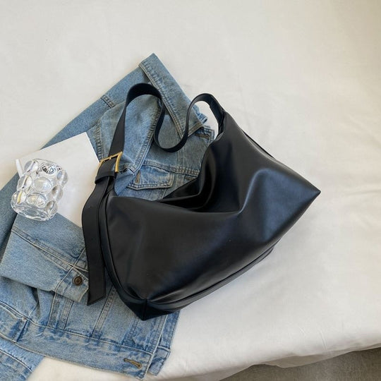 Damen Hobo-Tasche aus hochwertigem Leder mit elegantem asymmetrischem Design Nord Taschen