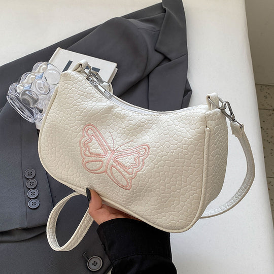 Damen Designer Handtasche mit ausgefallenem Schmetterlingsmotiv Nord Taschen