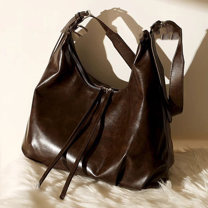 Damen Hobo-Tasche aus hochwertigem Kunstleder mit verstellbarem Schulterriemen und dekorativen Schnürdetails Nord Taschen