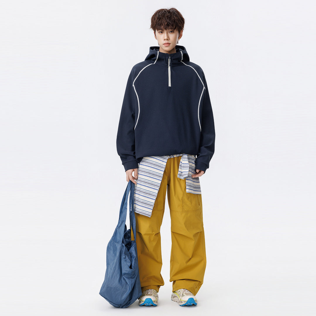 Unisex Oversize Waffelstruktur-Halbzip-Hoodie mit Raglanärmeln und Kontrastpaspeln Nord Taschen