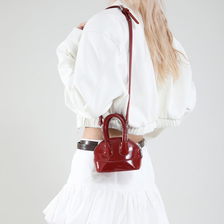 Damen Mini-Handtasche mit elegantem Hochglanz-Finish und abnehmbarem Schulterriemen Nord Taschen