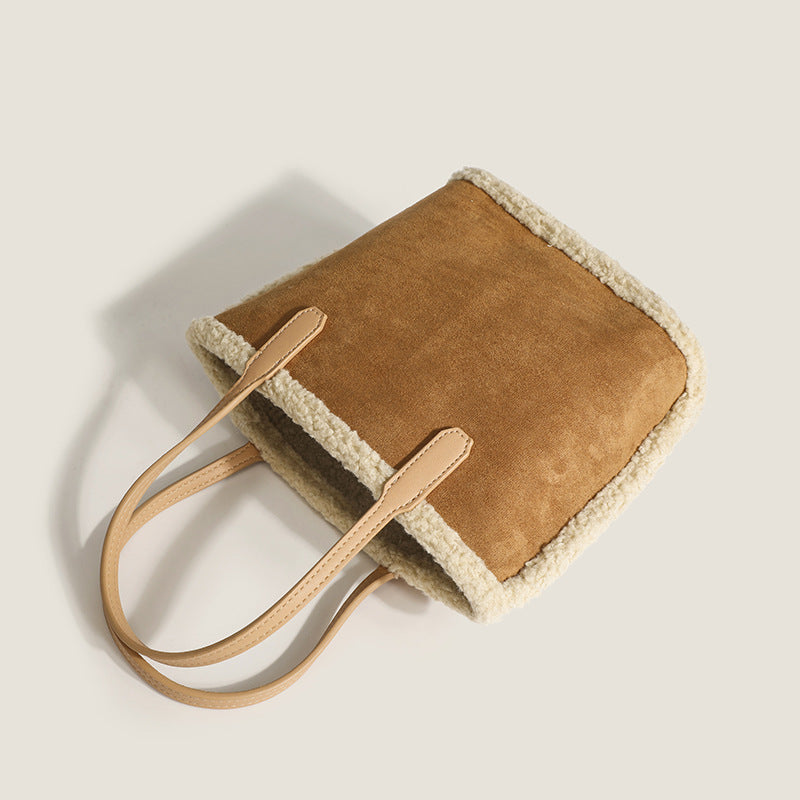 Damen Einkaufstasche aus hochwertigem Wildleder mit schickem Lammfellrand Nord Taschen