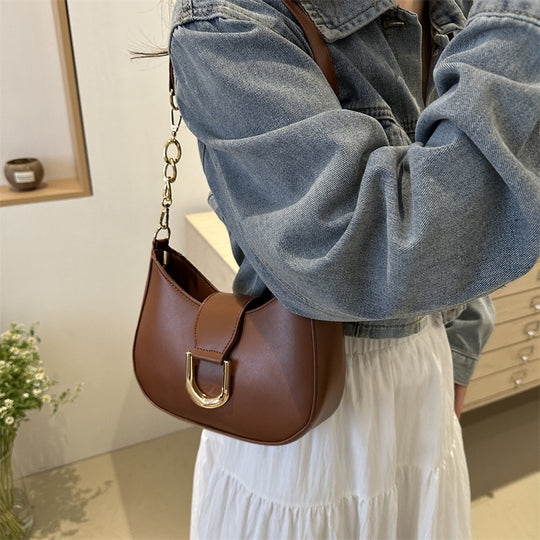 Damen Umhängetasche mit modernem Design und eleganter Schnallenverzierung Nord Taschen