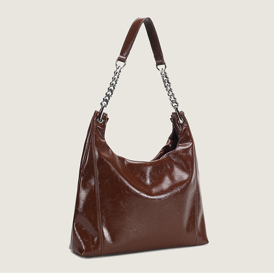 Damen Hobo-Tasche aus glänzendem Kunstleder mit luxuriösen Kettenakzenten Nord Taschen