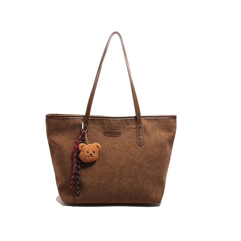 Damen elegante Tragetasche mit verspieltem Anhänger Nord Taschen