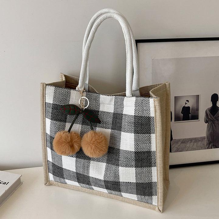 Damen Shopper-Tasche mit kariertem Design und verspielten Pompons Nord Taschen