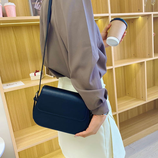 Damen Umhängetasche mit klassischer Klappenstruktur Nord Taschen