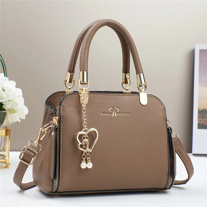 Damen strukturiertes Handtaschen-Design mit abnehmbarer Quaste Nord Taschen