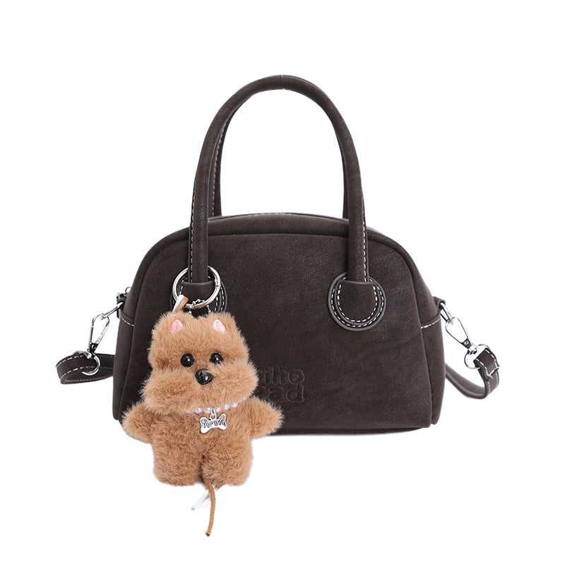 Damen-Handtasche mit verspieltem Tieranhänger Nord Taschen