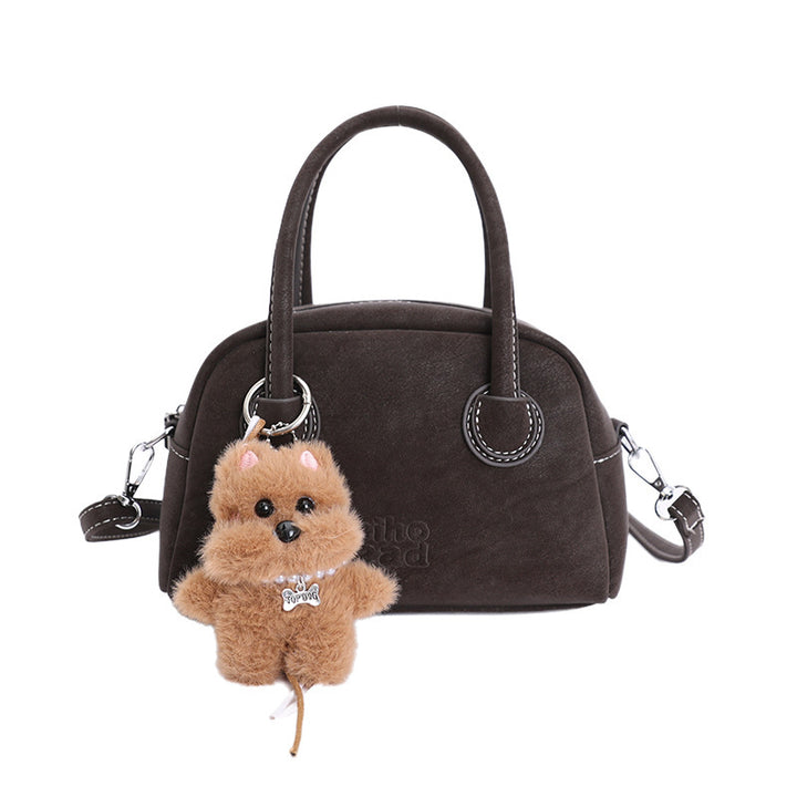 Damen-Handtasche mit verspieltem Tieranhänger Nord Taschen
