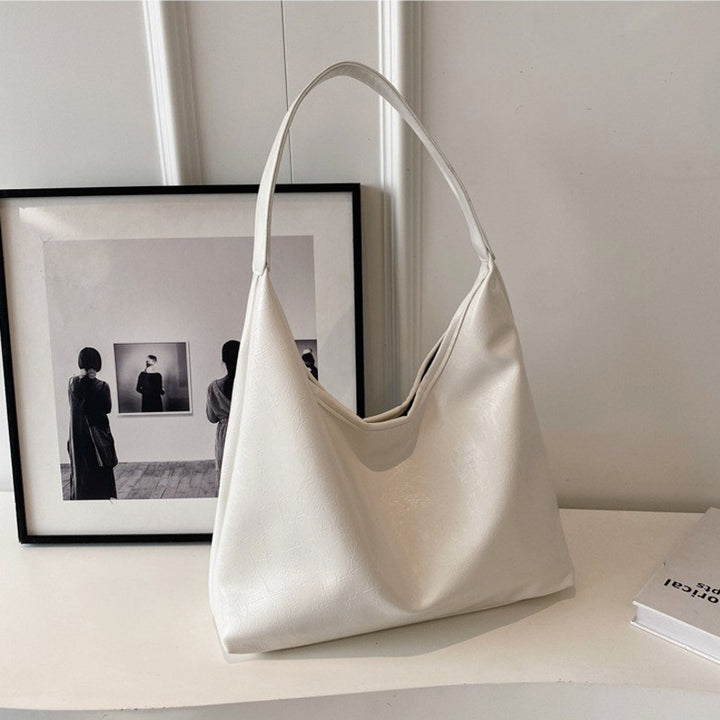 Damen Hobo-Tasche aus weich gewachsenem Kunstleder mit modernem Design Nord Taschen