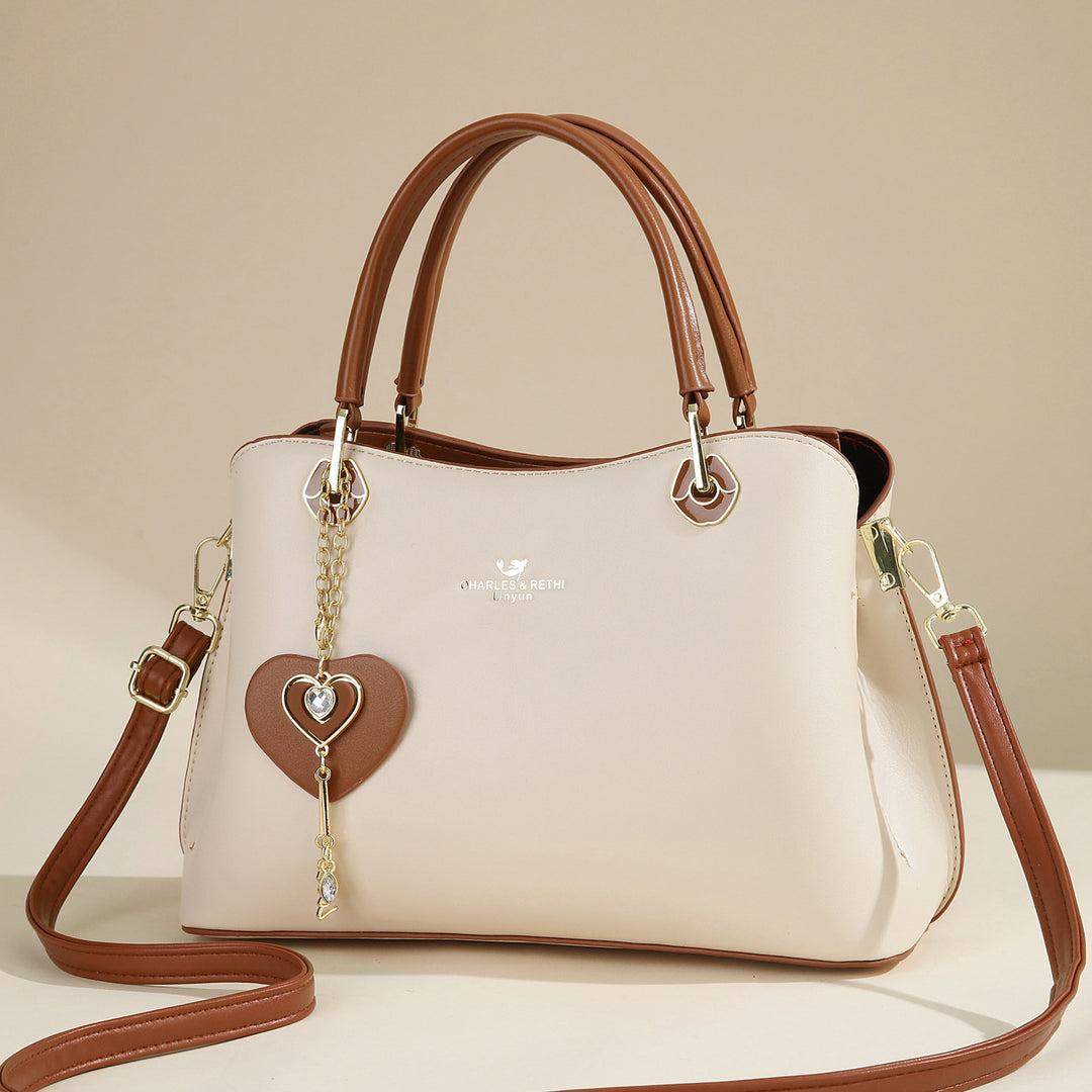 Damen elegante Handtasche mit Herzanhänger Nord Taschen