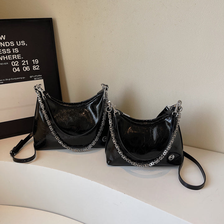 Damen moderne Umhängetasche mit auffälligem Kettenriemen Nord Taschen