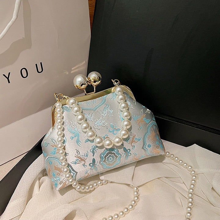 Damen elegante Clutch mit perlverziertem Rahmen Nord Taschen