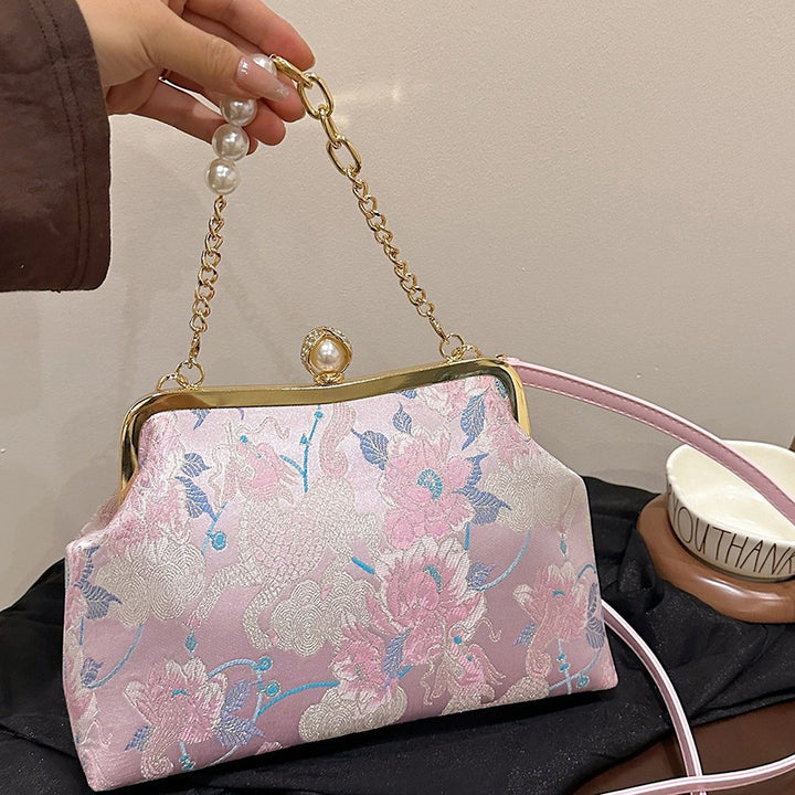 Damen elegante Clutch-Tasche mit floralem Motiv und exklusiver Kettenverzierung Nord Taschen